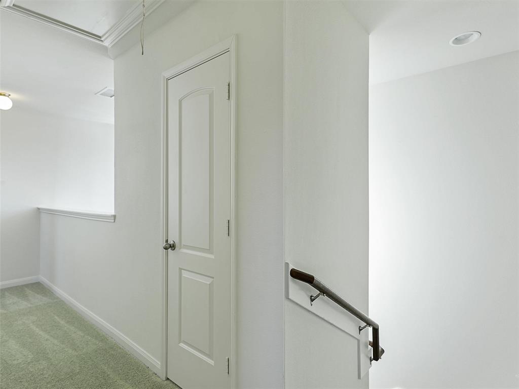 1402 Englemann Drive Princeton, TX 75407 - Photo 19 of 33 Upstairs hallway with new carpeting for the whole upstairs area