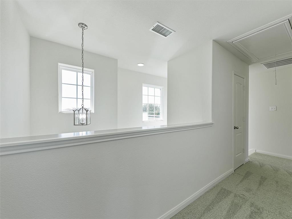 1402 Englemann Drive Princeton, TX 75407 - Photo 20 of 33 Upstairs open to below