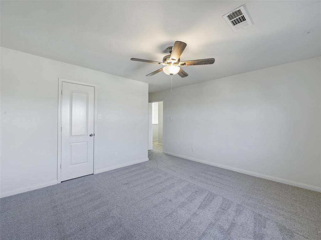 1402 Englemann Drive Princeton, TX 75407 - Photo 24 of 33 Bedroom #3 with a huge walkin closet