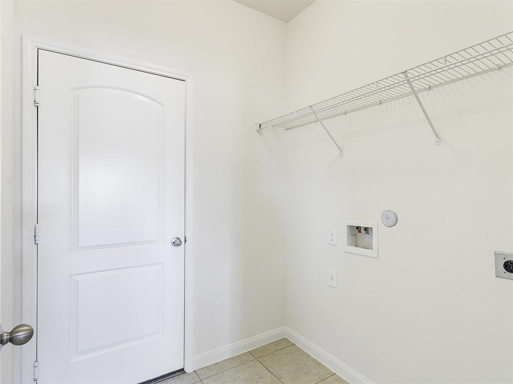 1402 Englemann Drive Princeton, TX 75407 - Photo 25 of 33 Full size for washer and dryer (electric) and opens to garage