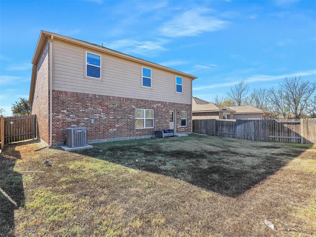 1402 Englemann Drive Princeton, TX 75407 - Photo 29 of 33 Backyard is pool sized and ready for all the family and pets