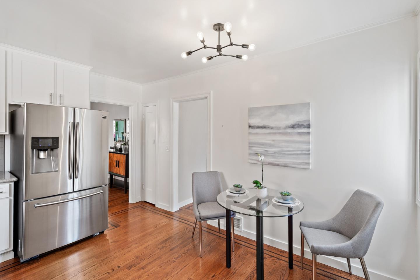 2218 Hale Drive Burlingame, CA 94010 - Photo 15 of 45 a kitchen with stainless steel appliances a refrigerator a table and chairs