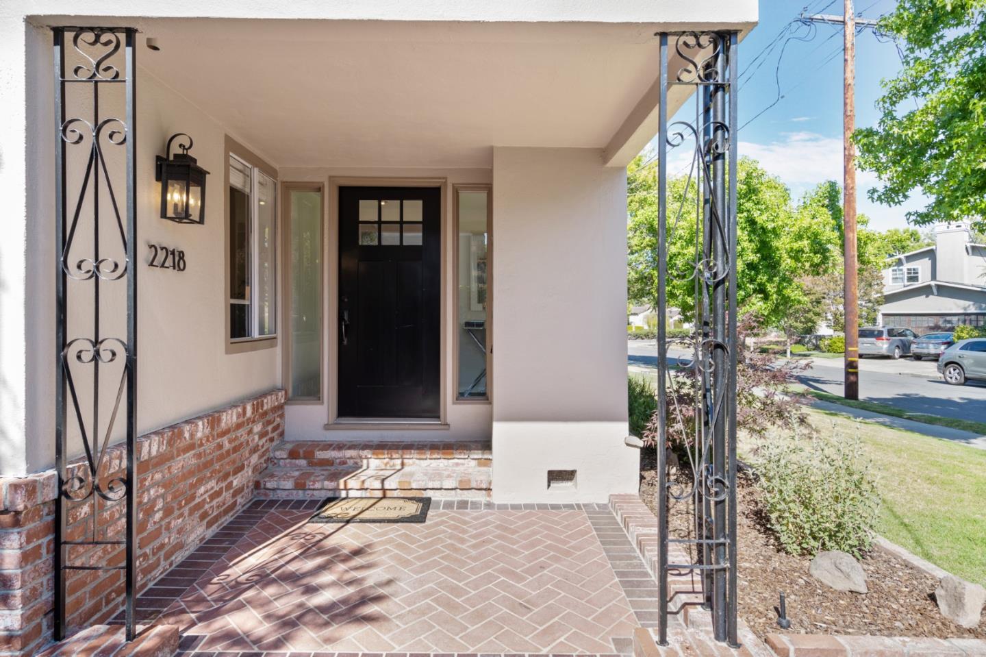 2218 Hale Drive Burlingame, CA 94010 - Photo 3 of 45 a front view of a house with trees