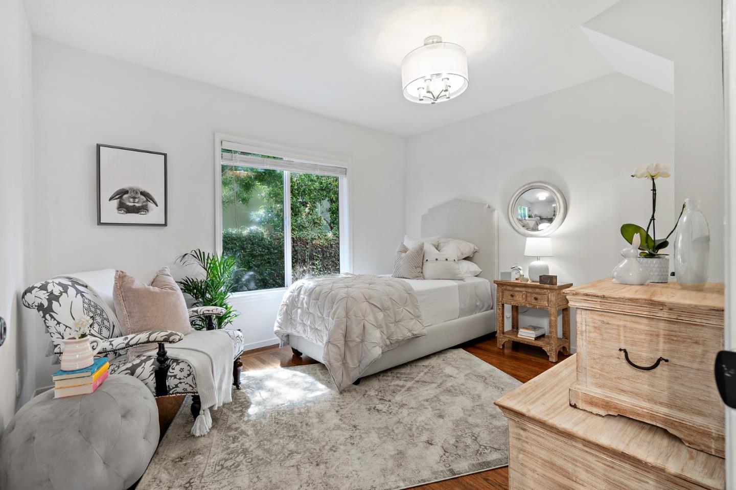 2218 Hale Drive Burlingame, CA 94010 - Photo 31 of 45 a bedroom with a bed and ceiling fan