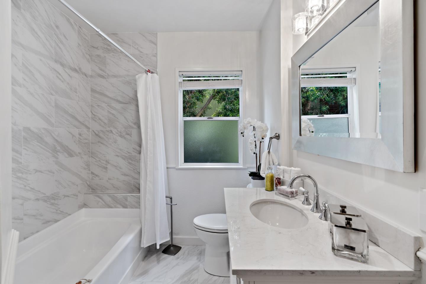 2218 Hale Drive Burlingame, CA 94010 - Photo 38 of 45 a bathroom with a sink toilet and shower