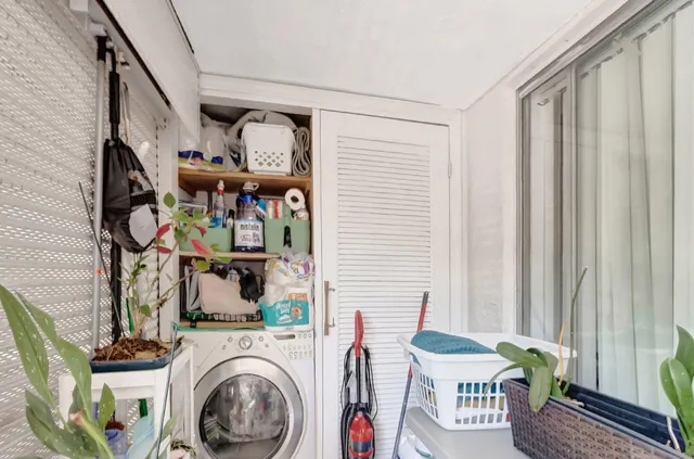 a view of living room washer and dryer