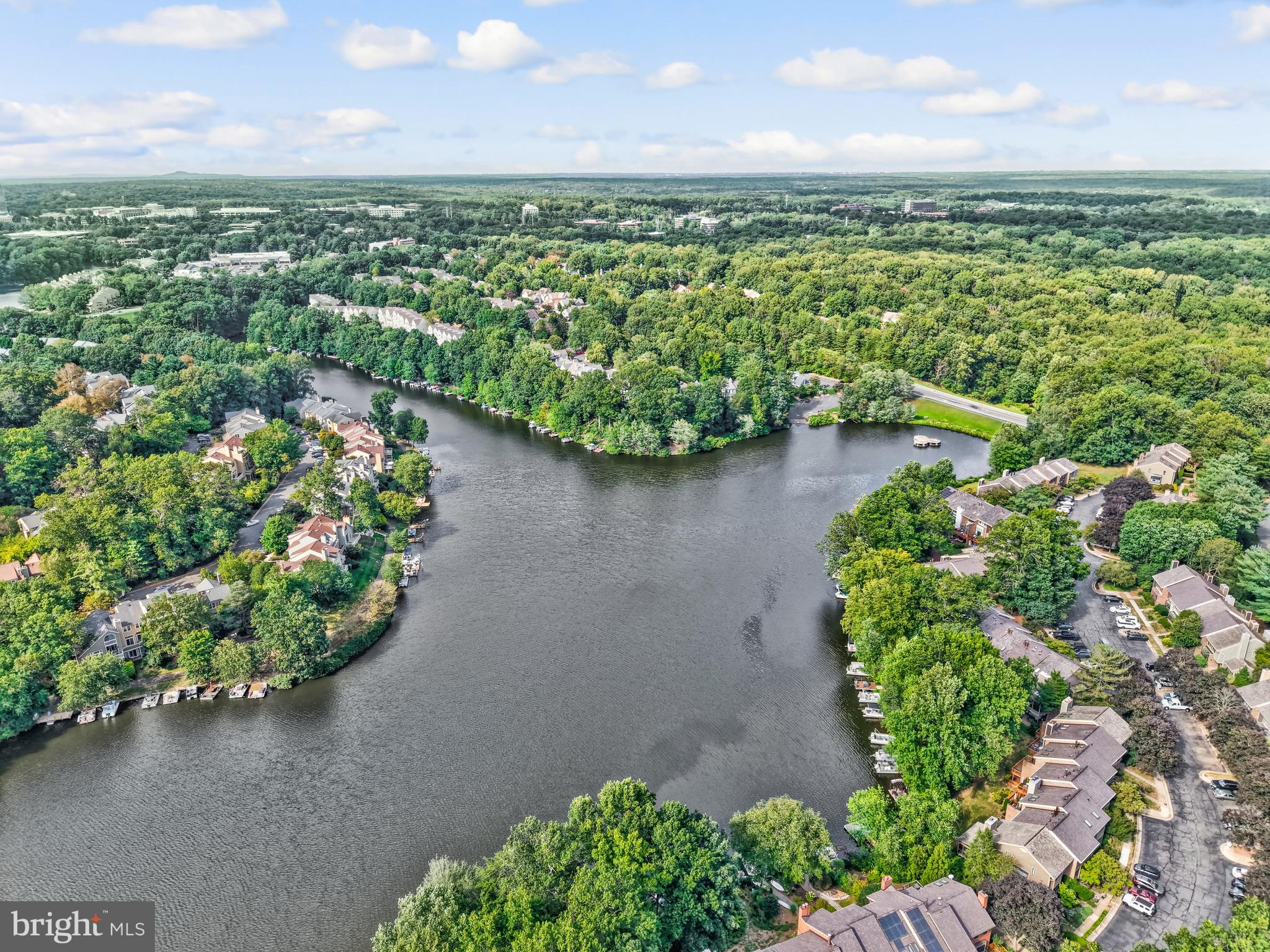 11088 Glade Court Reston, VA 20191 - Photo 64 of 75 a view of a lake with a city