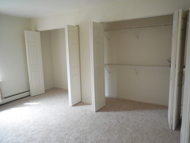 2100 Light Road, Unit 207 Oswego, IL 60543 - Photo 11 of 14 an empty room with closet