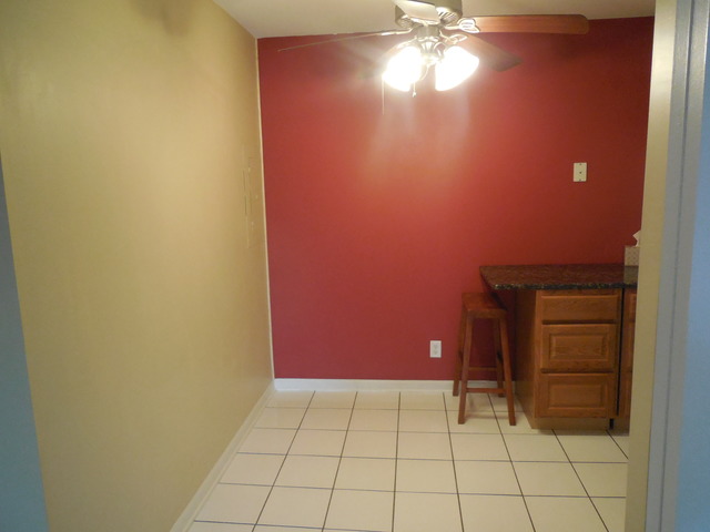 2100 Light Road, Unit 207 Oswego, IL 60543 - Photo 9 of 14 a view of an empty room and window