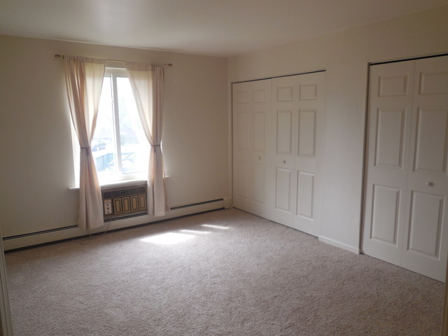 2100 Light Road, Unit 207 Oswego, IL 60543 - Photo 10 of 14 a view of empty room with window