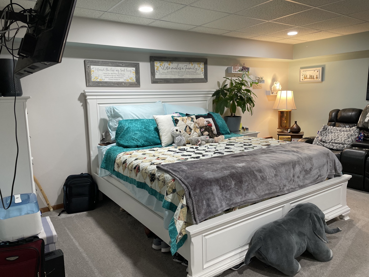 33582 North State Road Genoa, IL 60135 - Photo 14 of 21 a bedroom with a bed and a potted plant