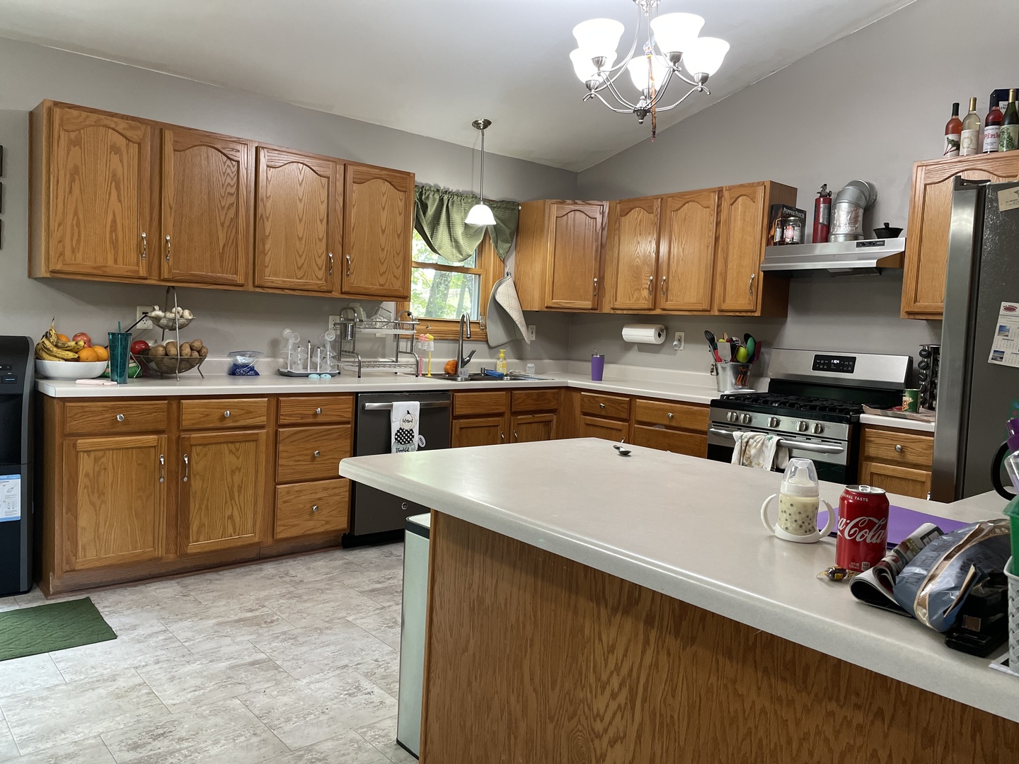 33582 North State Road Genoa, IL 60135 - Photo 6 of 21 a kitchen with a sink a stove and cabinets