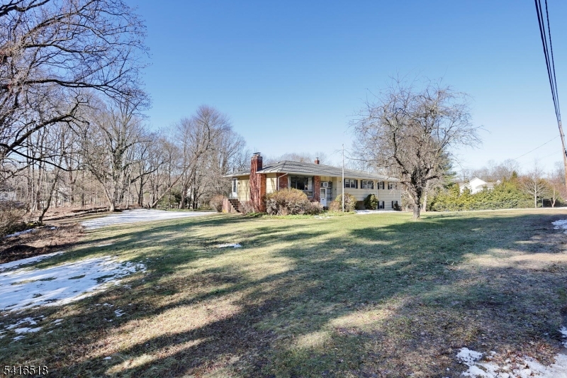219 Haven Road Franklin Lakes, NJ 07417 - Photo 9 of 9 a view of a house with a yard