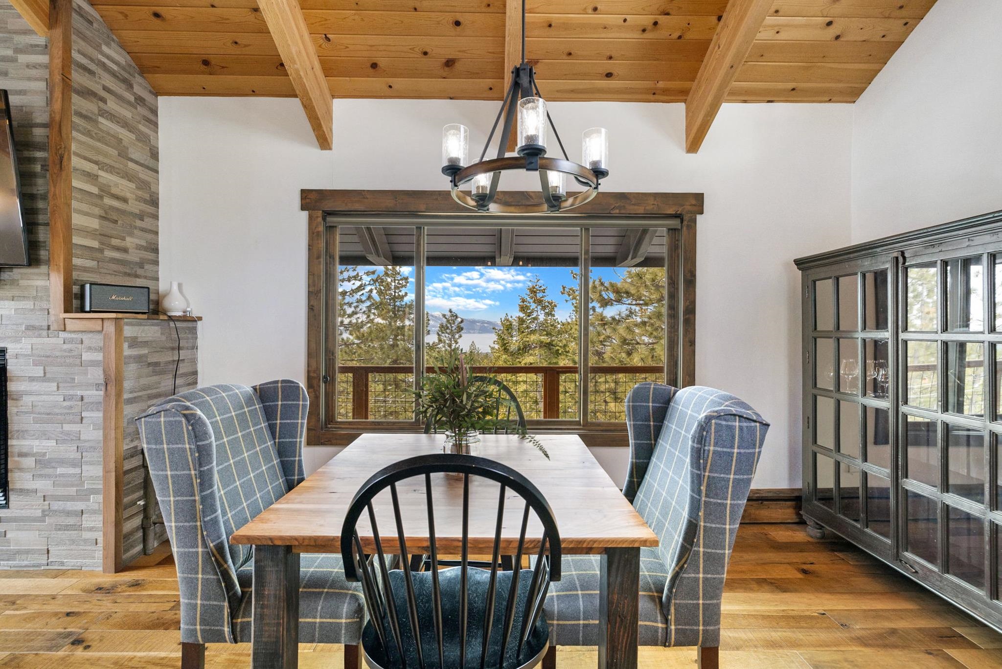 520 Laurel Lane Stateline, NV 89449 - Photo 12 of 27 a view of a dining room with furniture window and wooden floor