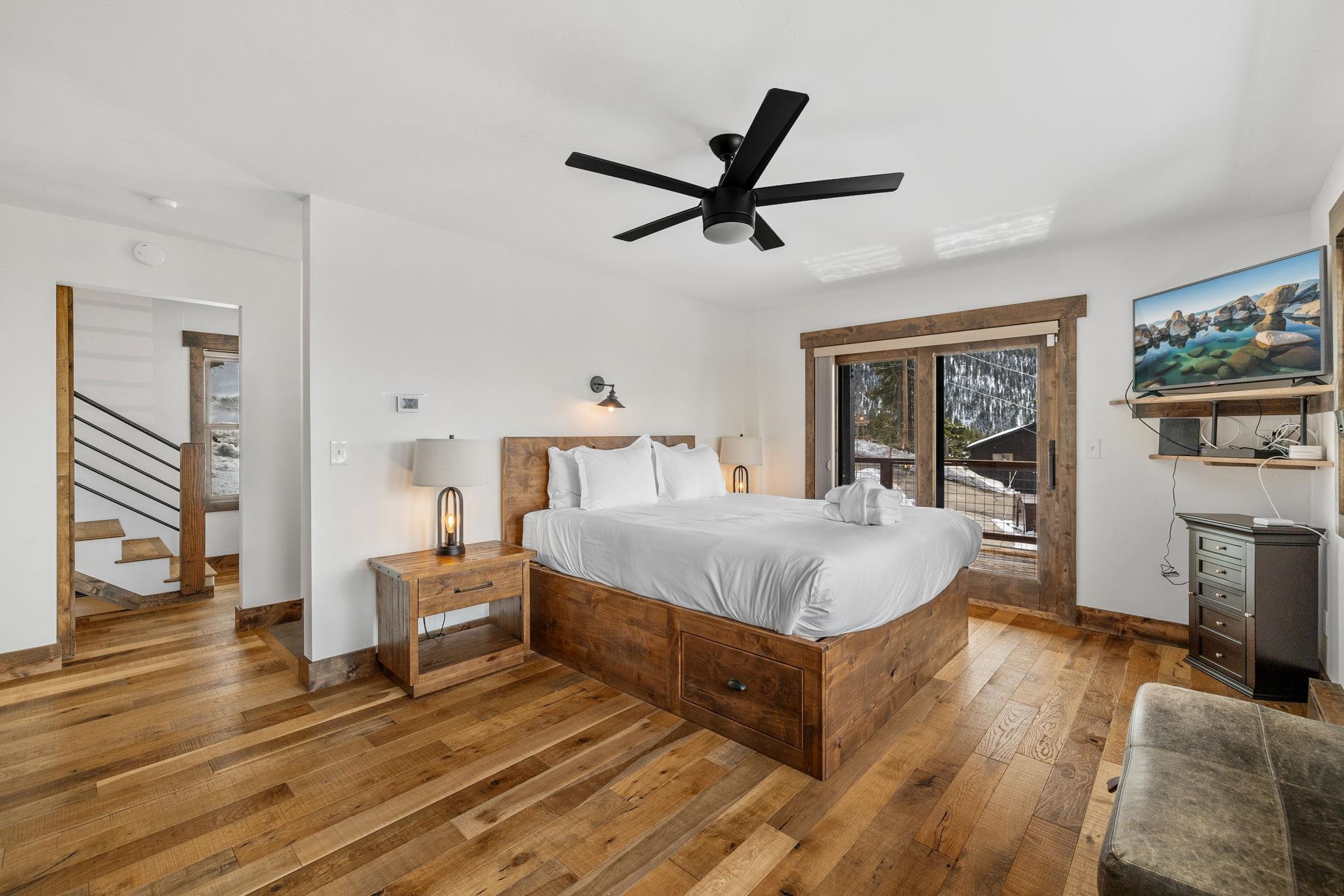 520 Laurel Lane Stateline, NV 89449 - Photo 14 of 27 a spacious bedroom with a bed and dresser