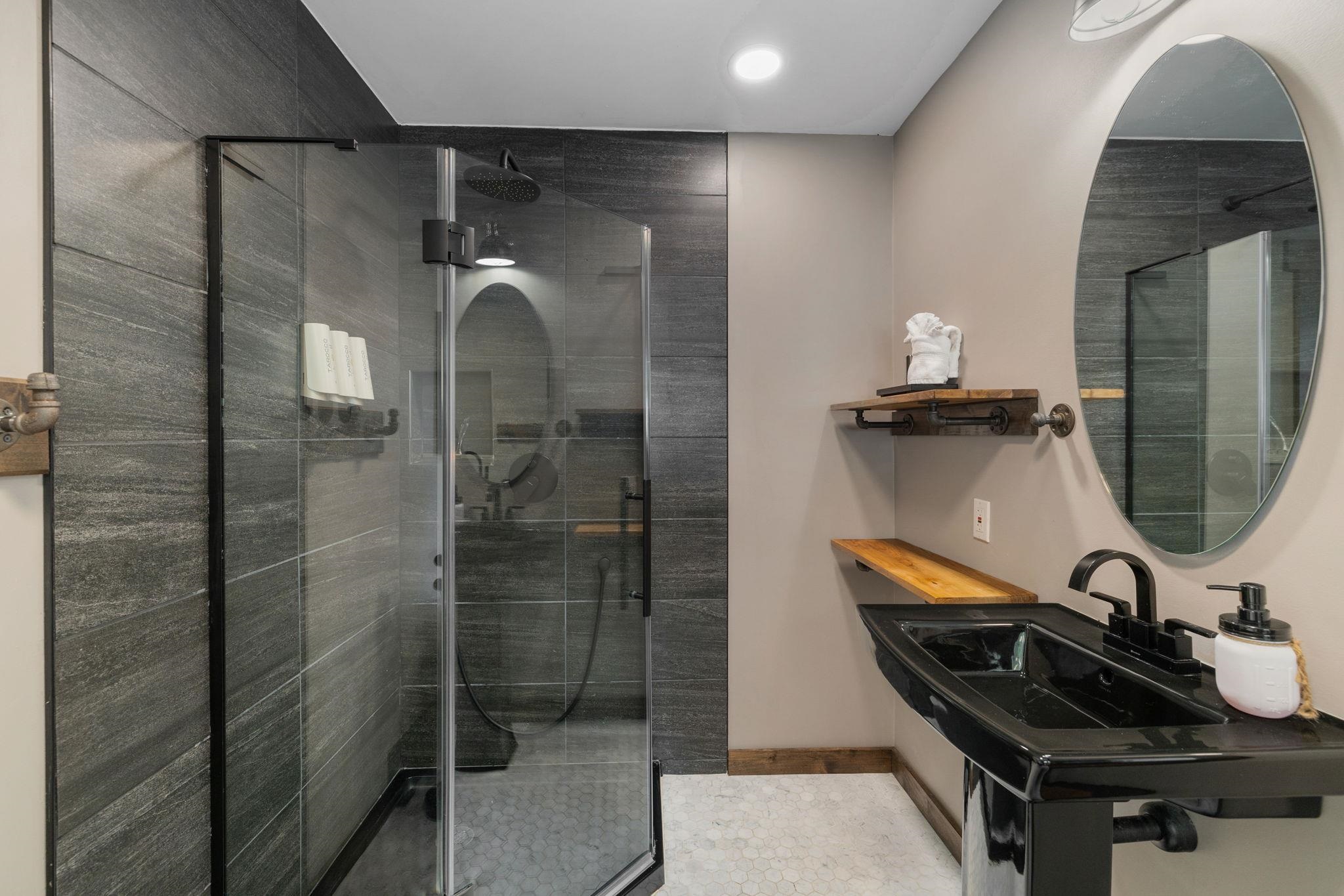 520 Laurel Lane Stateline, NV 89449 - Photo 22 of 27 a bathroom with a sink and mirror