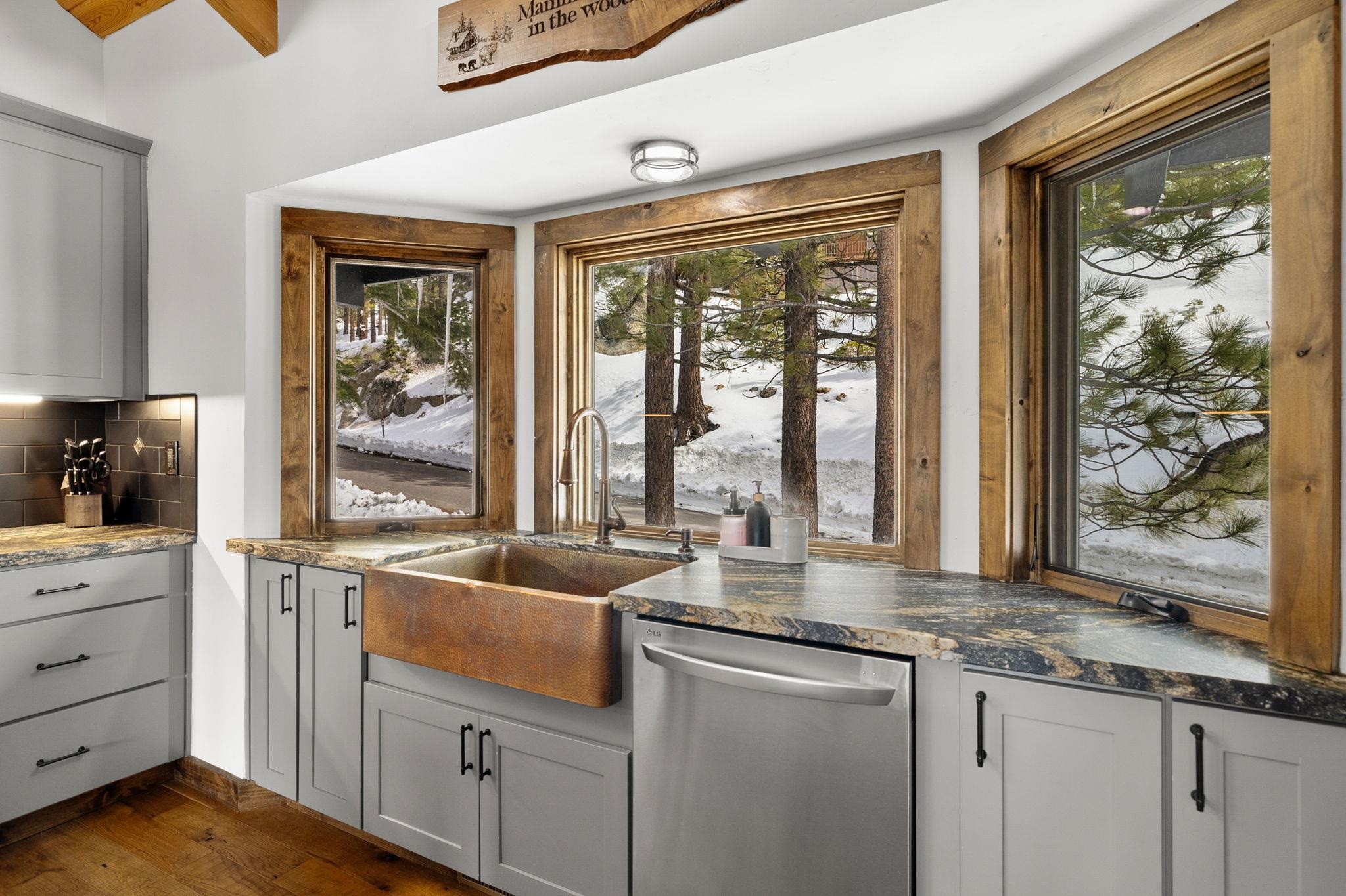 520 Laurel Lane Stateline, NV 89449 - Photo 9 of 27 a kitchen with granite countertop a sink and a window