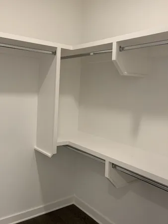 a view of small space with racks on the wall