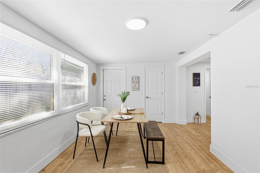 6338 Nashua Drive Port Richey, FL 34668 - Photo 17 of 49 a workspace room with furniture window and wooden floor