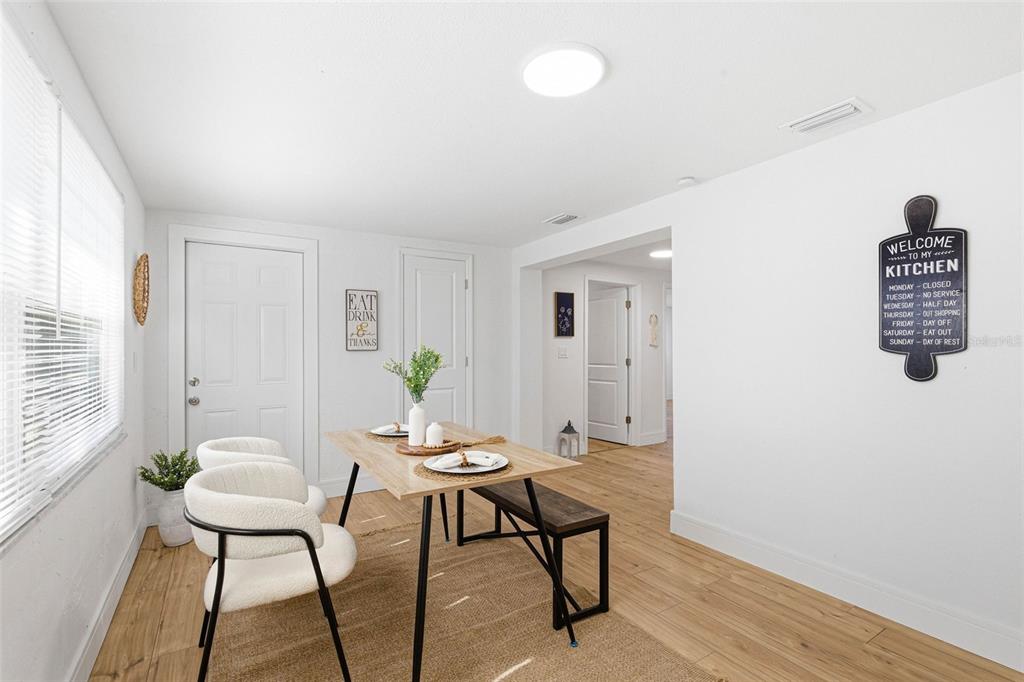 6338 Nashua Drive Port Richey, FL 34668 - Photo 18 of 49 a view of a workspace room with furniture and wooden floor