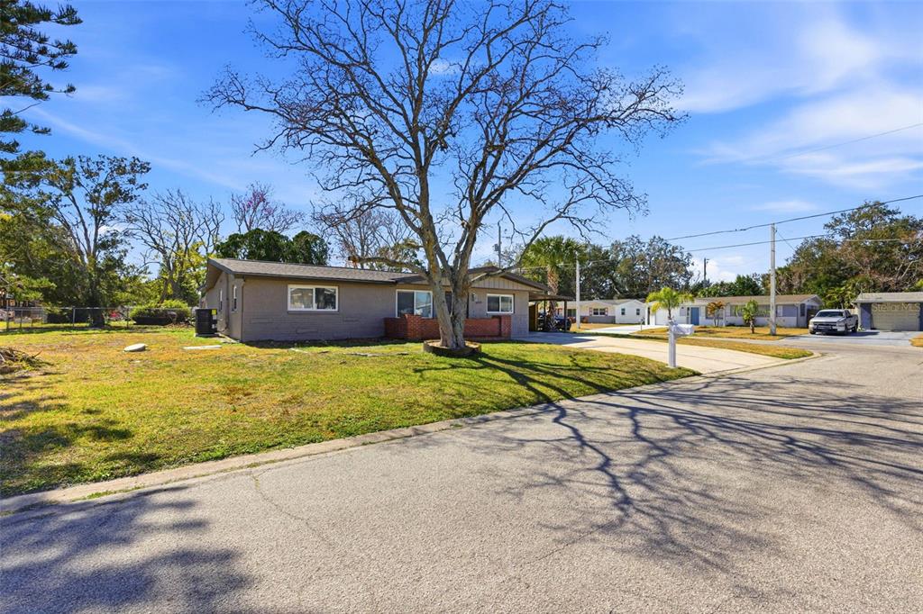6338 Nashua Drive Port Richey, FL 34668 - Photo 39 of 49 a view of outdoor space yard and swimming pool