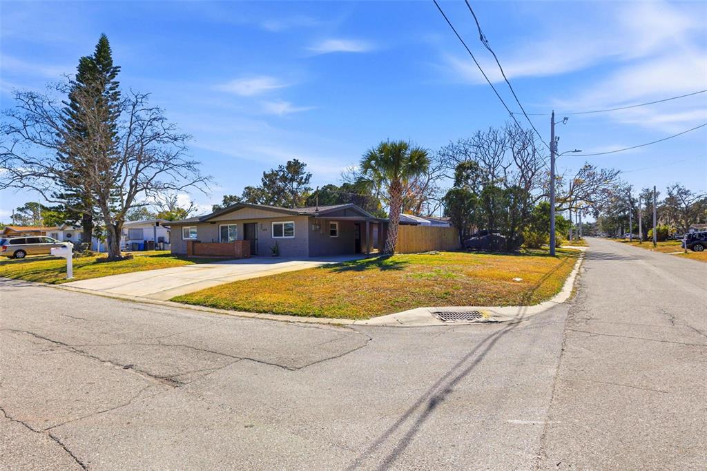 6338 Nashua Drive Port Richey, FL 34668 - Photo 41 of 49 a view of outdoor space yard and swimming pool