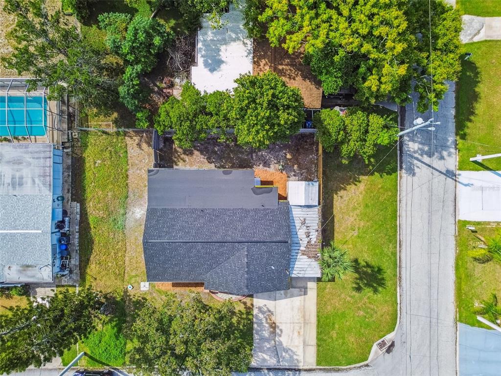 6338 Nashua Drive Port Richey, FL 34668 - Photo 48 of 49 an aerial view of a house with a yard