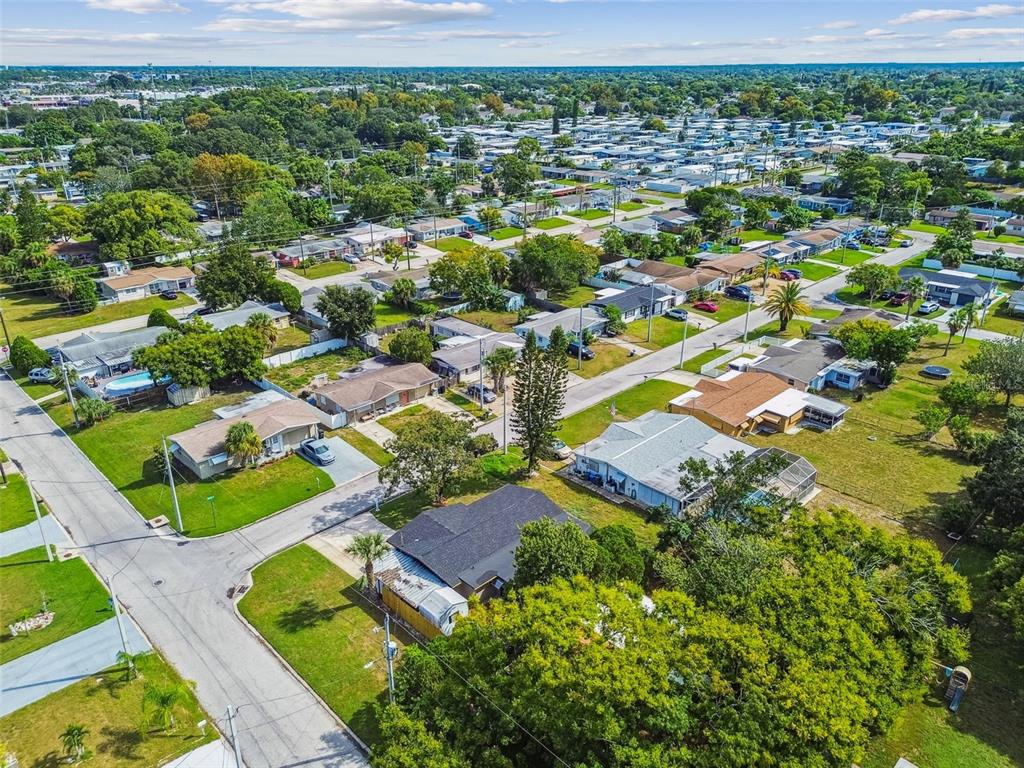 6338 Nashua Drive Port Richey, FL 34668 - Photo 49 of 49 an aerial view of residential houses with outdoor space and street view