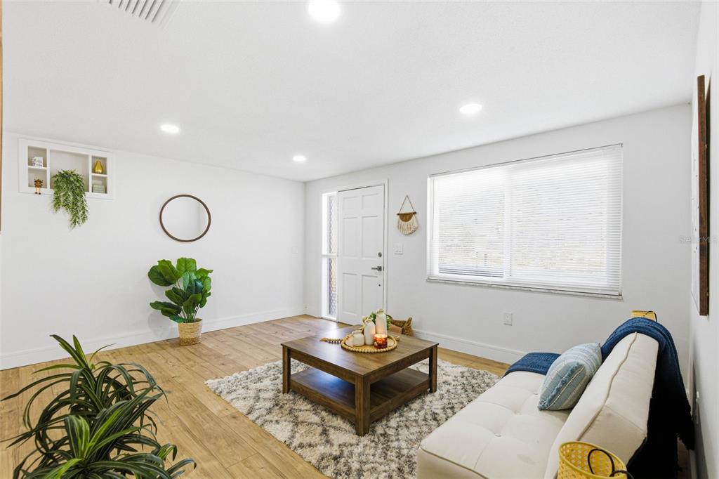 6338 Nashua Drive Port Richey, FL 34668 - Photo 7 of 49 a living room with furniture
