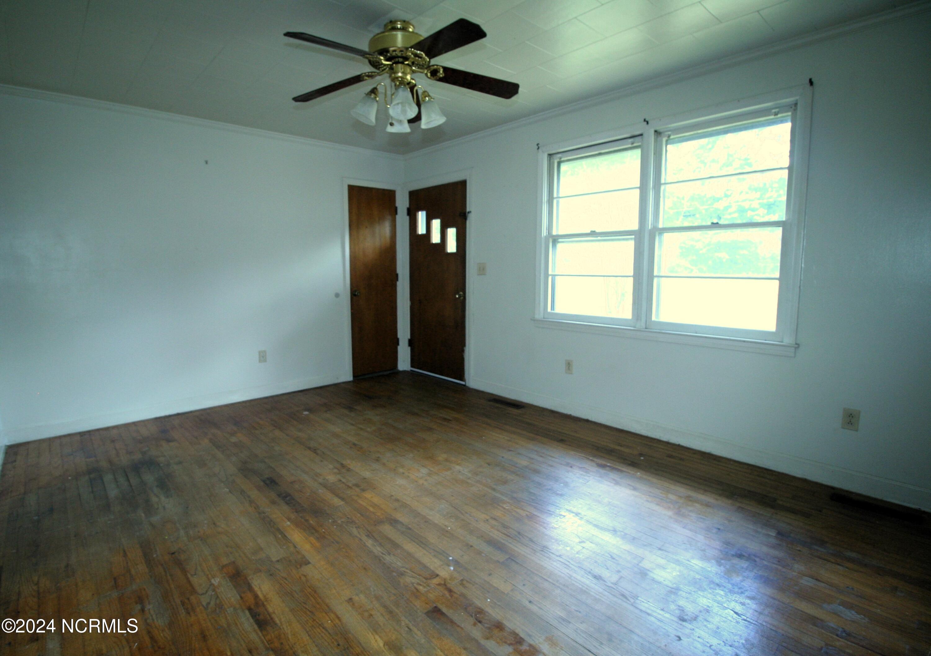 731 Newland Road Roper, NC 27970 - Photo 3 of 21 Original Hardwood Floors in Living Room