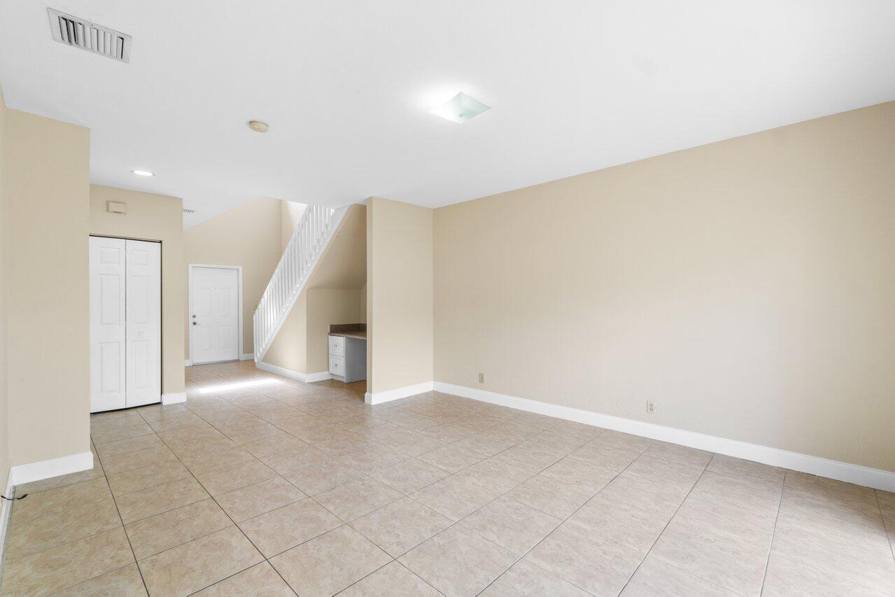 809 Talia Circle, Unit 809 TALIA CIRCLE Palm Springs, FL 33461 - Photo 15 of 23 a view of an empty room with a window
