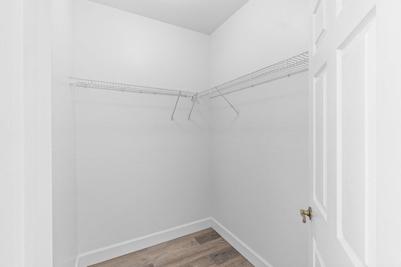 809 Talia Circle, Unit 809 TALIA CIRCLE Palm Springs, FL 33461 - Photo 20 of 23 a view of a room with wooden floor