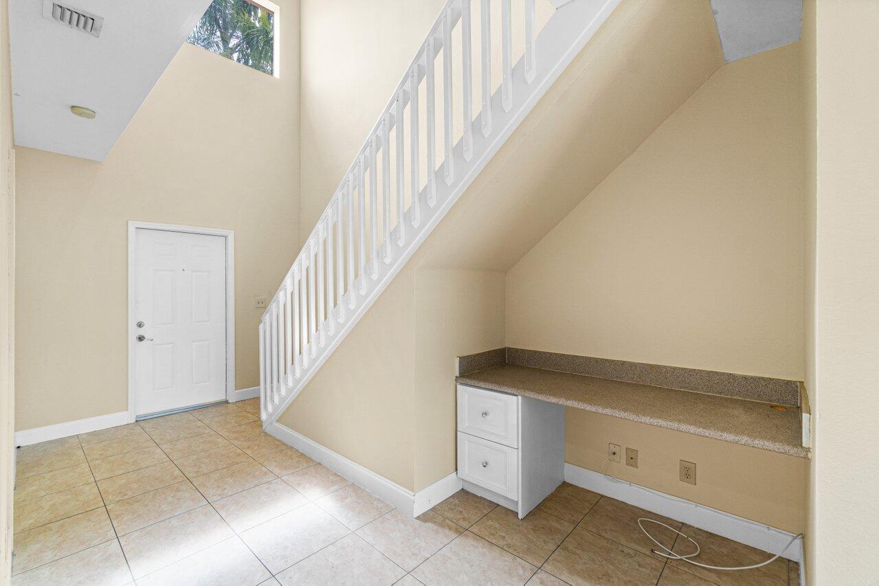 809 Talia Circle, Unit 809 TALIA CIRCLE Palm Springs, FL 33461 - Photo 6 of 23 a view of entryway and hall