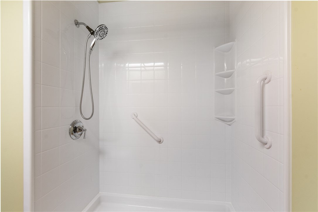 6592 Tuckahoe Road Williamson, NY 14589 - Photo 20 of 40 The tub surround in one of the TWO FULL BATHS in this home