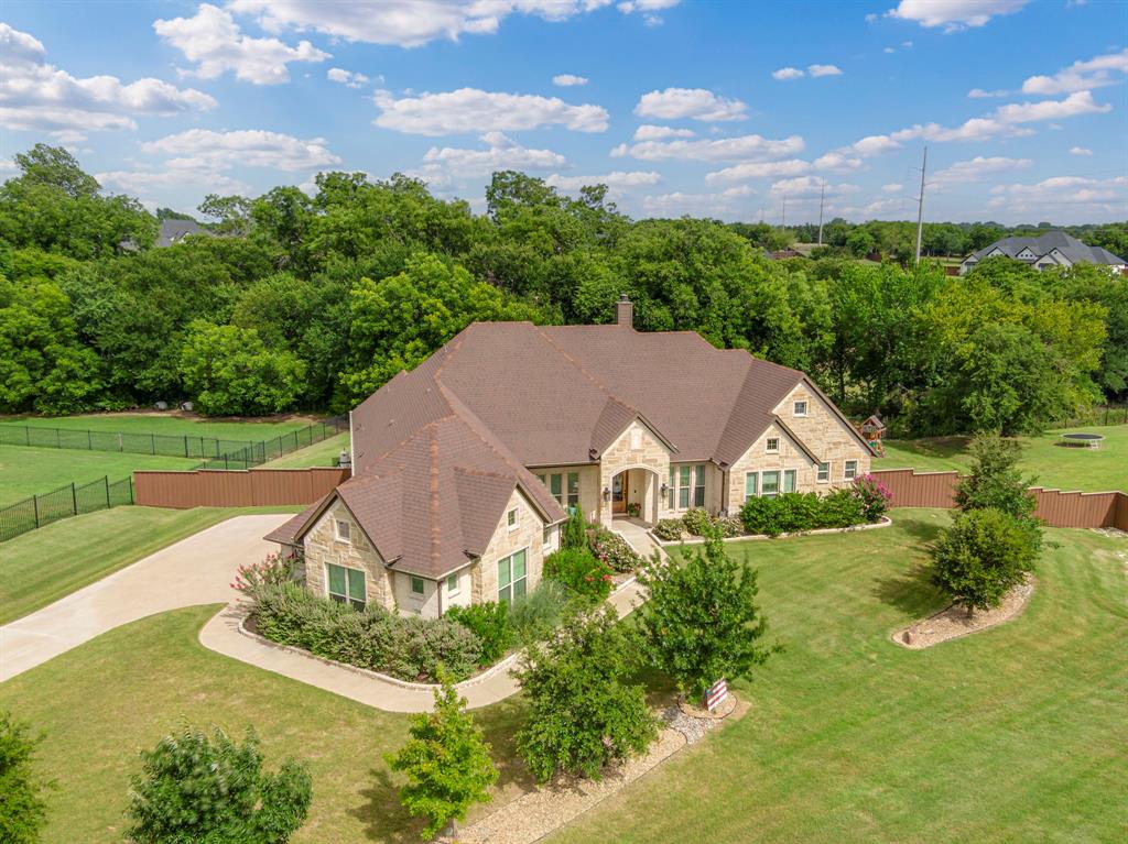 1310 Rustic Ridge Drive Midlothian, TX 76065 - Photo 1 of 36 an aerial view of a house