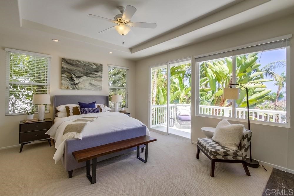 2727 Carriagedale Row La Jolla, CA 92037 - Photo 13 of 25 a bed room with a bed and a chair