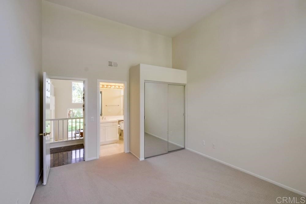 2727 Carriagedale Row La Jolla, CA 92037 - Photo 17 of 25 a view of empty room with windows