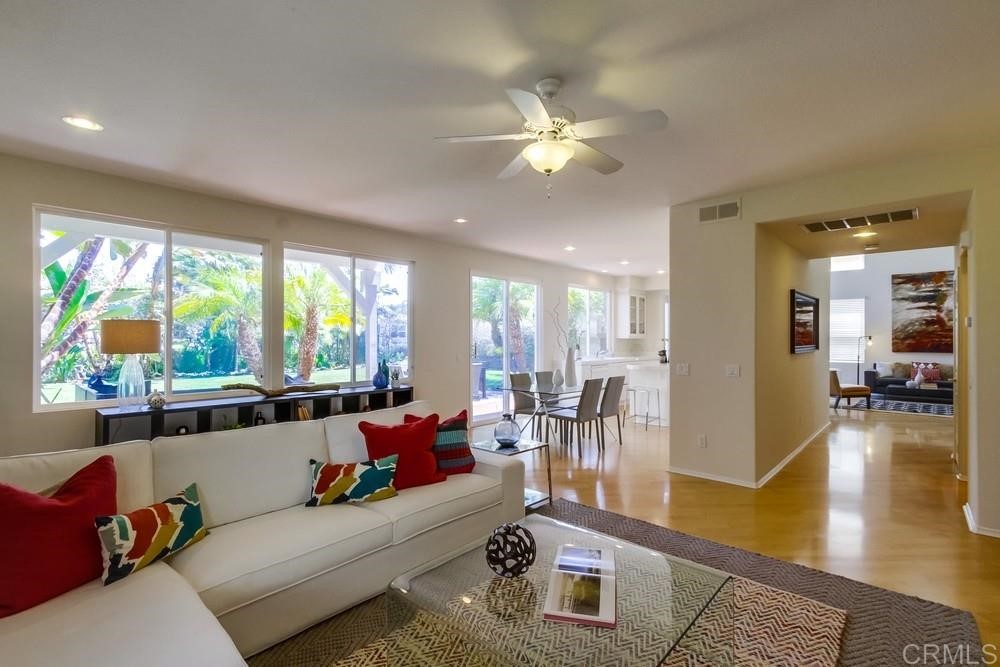 2727 Carriagedale Row La Jolla, CA 92037 - Photo 7 of 25 a living room with furniture and a large window