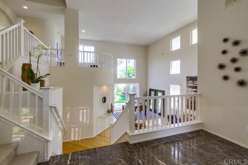 2727 Carriagedale Row La Jolla, CA 92037 - Photo 10 of 25 a view of a livingroom with furniture and staircase