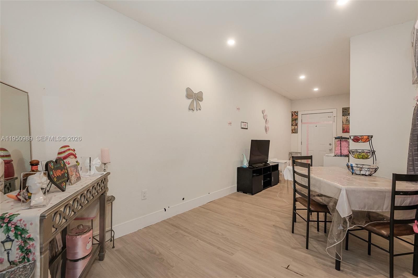 110 Northwest 58th Street Miami, FL 33127 - Photo 11 of 27 a view of a workspace with furniture