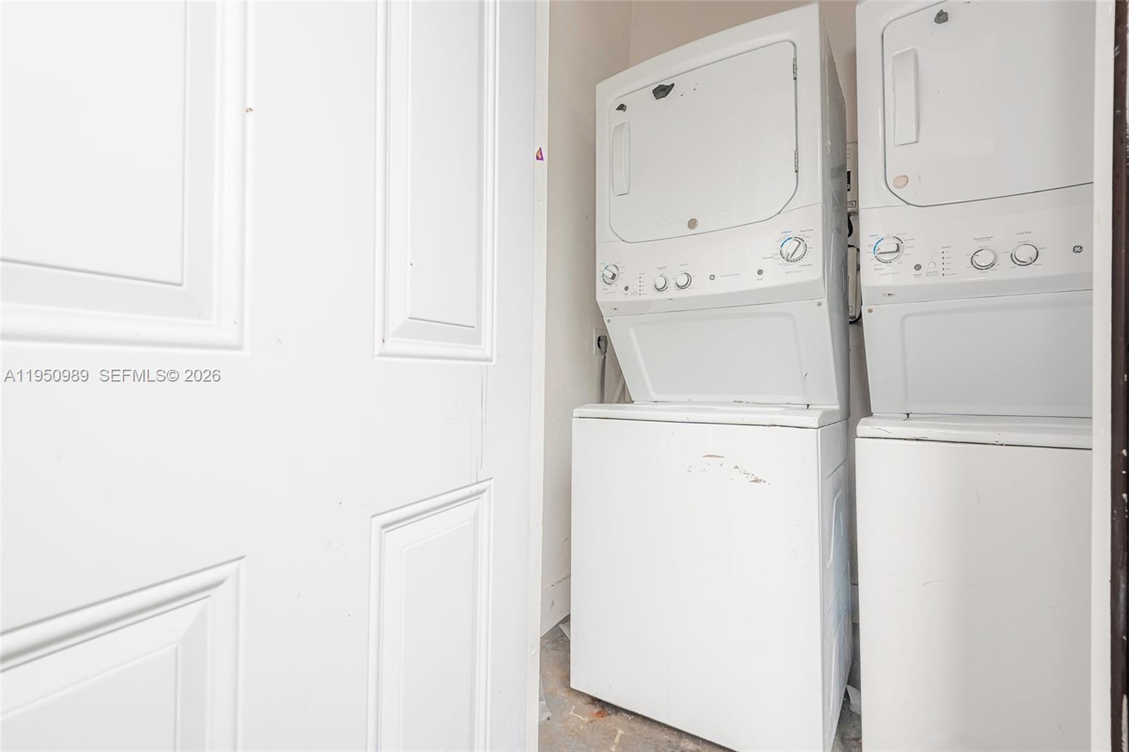 110 Northwest 58th Street Miami, FL 33127 - Photo 22 of 27 a utility room with dryer and washer