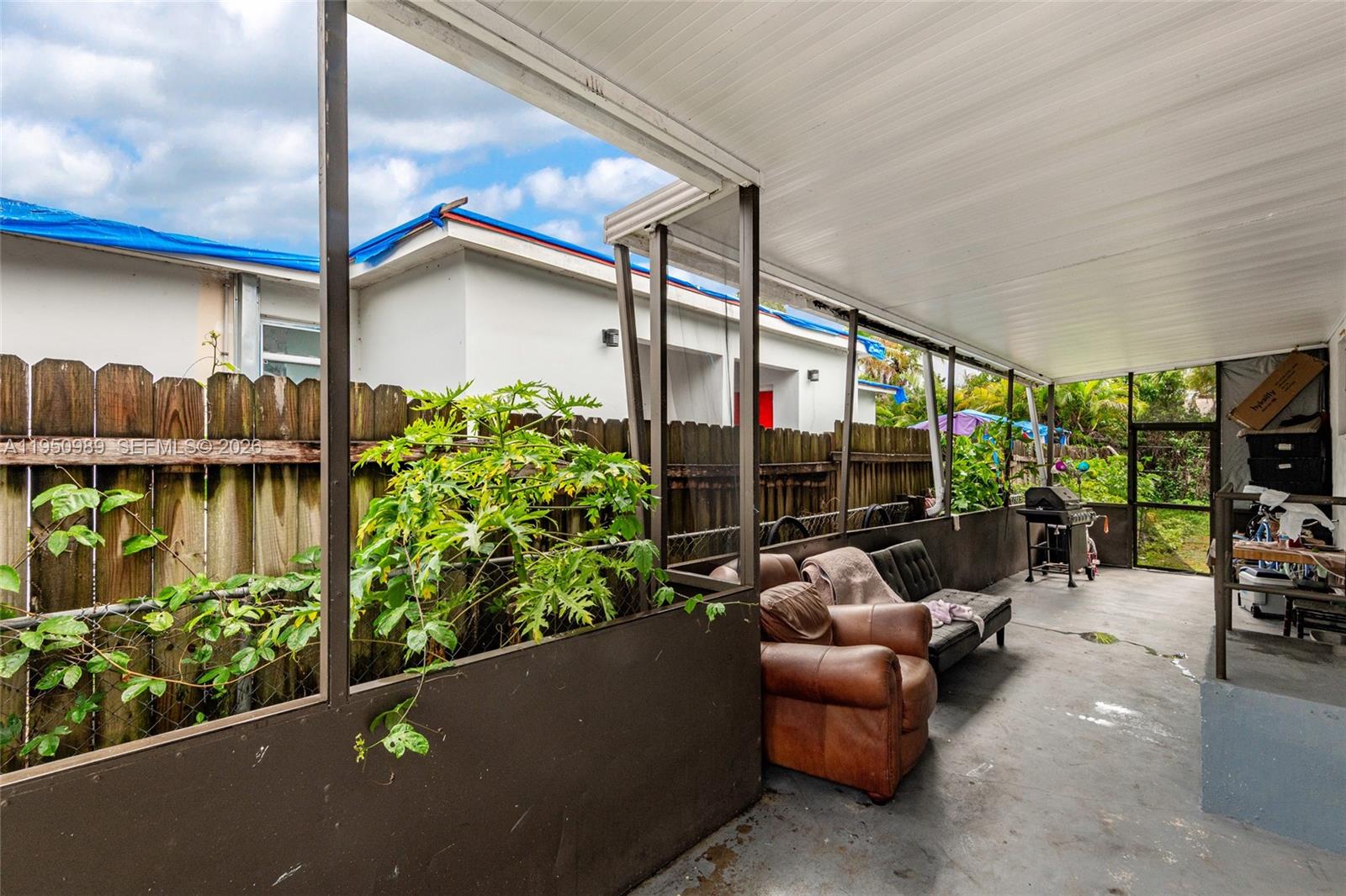 110 Northwest 58th Street Miami, FL 33127 - Photo 23 of 27 a outdoor living space with furniture