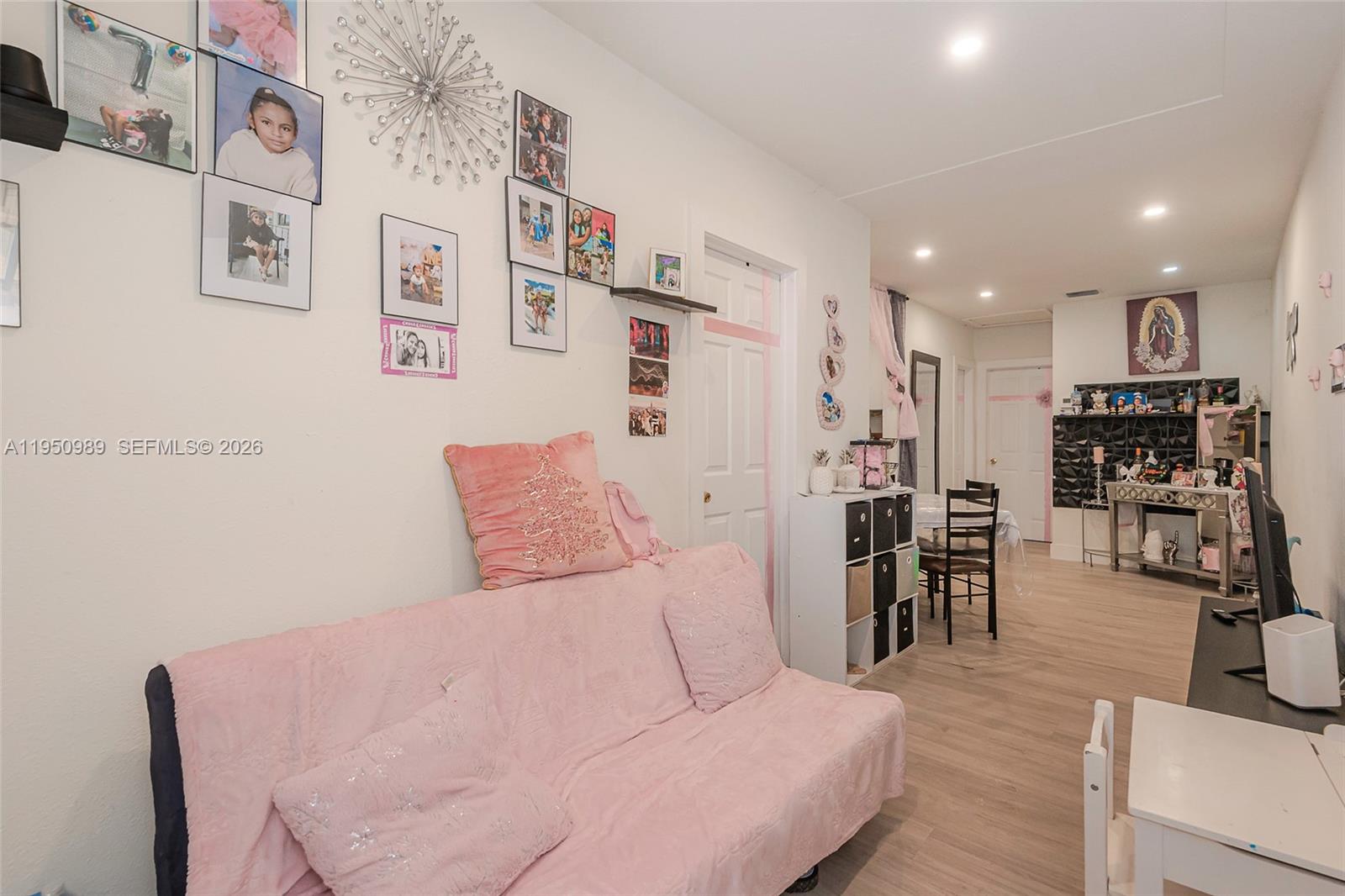 110 Northwest 58th Street Miami, FL 33127 - Photo 3 of 27 a living room with furniture and kitchen view