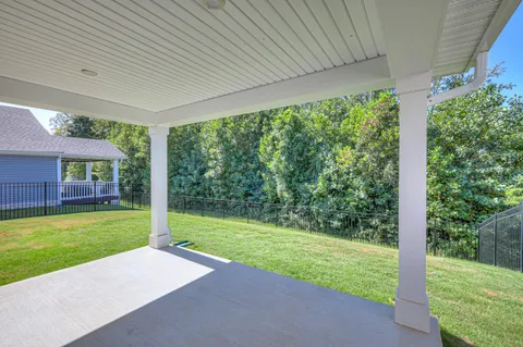 a view of a porch with a backyard