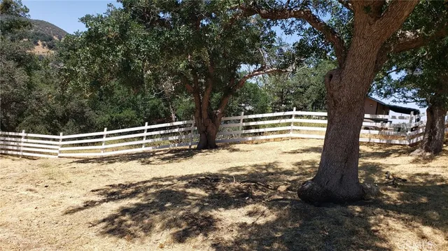 a view of swimming pool with chairs