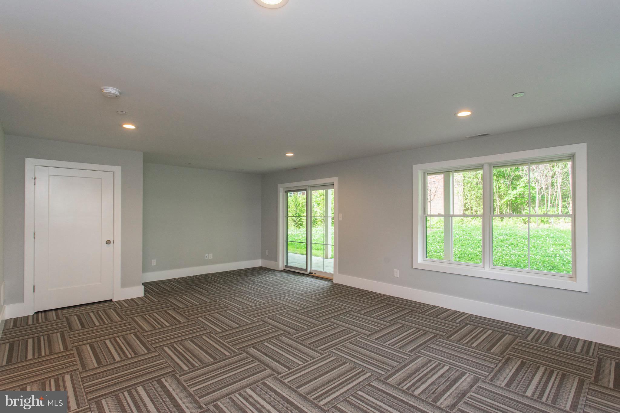 20 Price Avenue Narberth, PA 19072 - Photo 23 of 56 Family room with 1/2 bath and walk out to patio