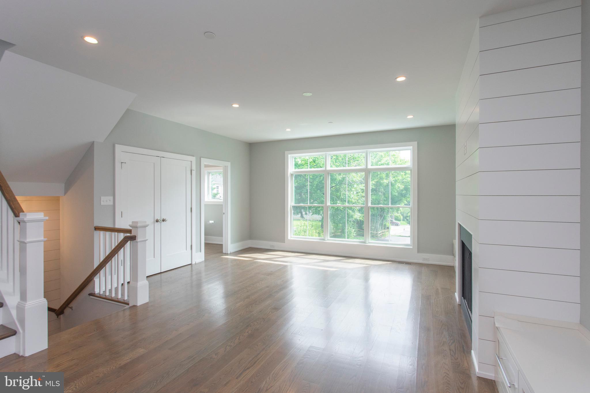 20 Price Avenue Narberth, PA 19072 - Photo 5 of 56 Living room with triple front window