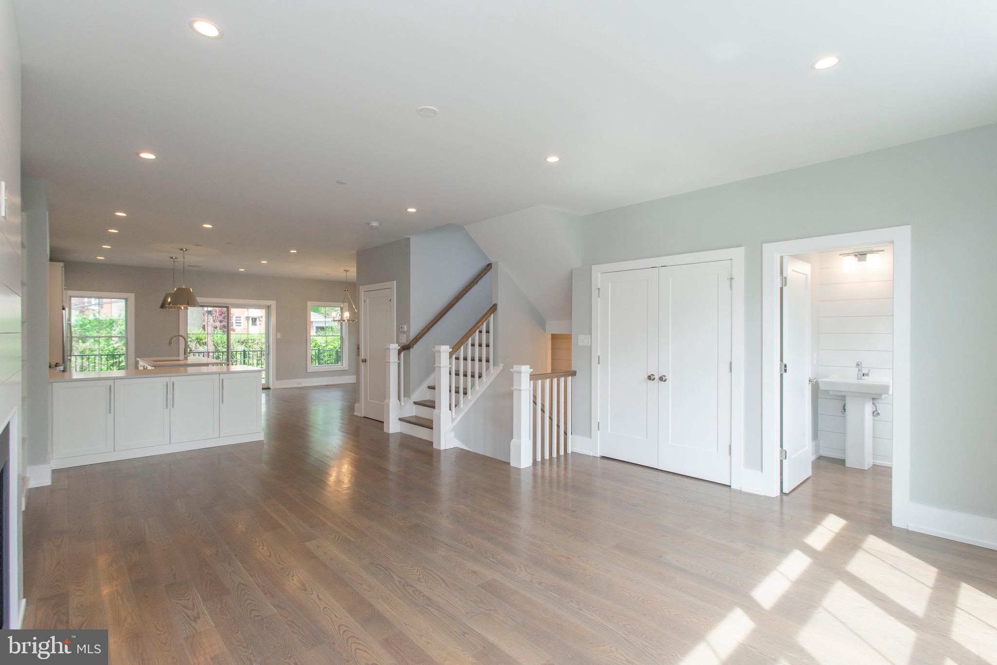 20 Price Avenue Narberth, PA 19072 - Photo 8 of 56 Living room open to dining room and kitchen