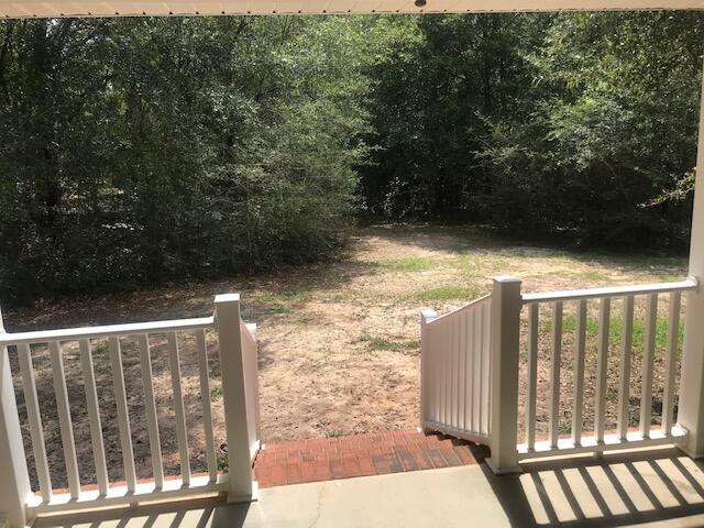 4270 Painter Branch Road Crestview, FL 32539 - Photo 16 of 24 a view of balcony with wooden floor