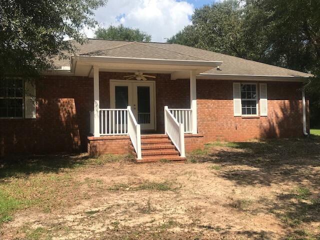 4270 Painter Branch Road Crestview, FL 32539 - Photo 18 of 24 a view of a house with a yard and plants